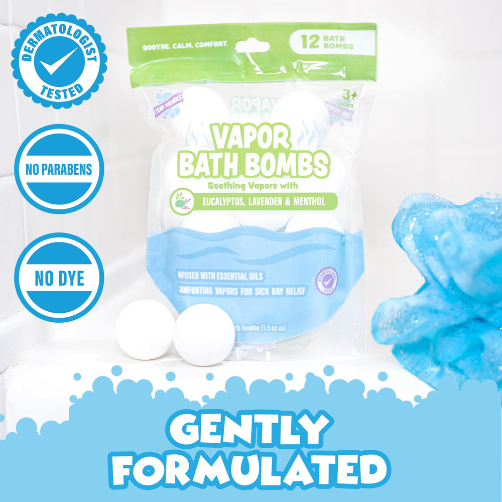 Tub Works Vapor Bath Bombs dissolving in tub water with rising vapors