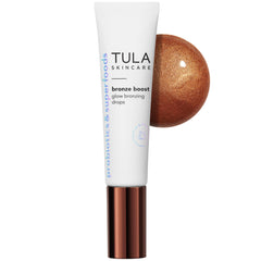 TULA Bronze Boost Glow bottle with pump for easy application and radiant finish.