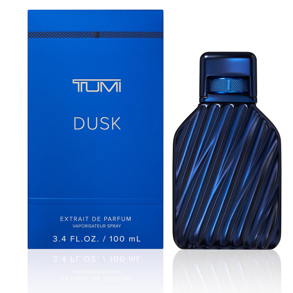 TUMI DUSK bottle close-up highlighting the woody aromatic profile for confident days.