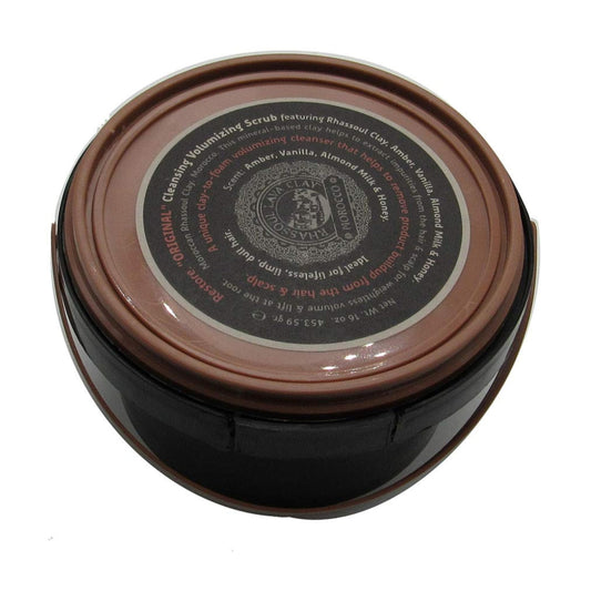 Tweakd by Nature Cleansing Scrub bottle shows amber vanilla scent for a refreshing shower.