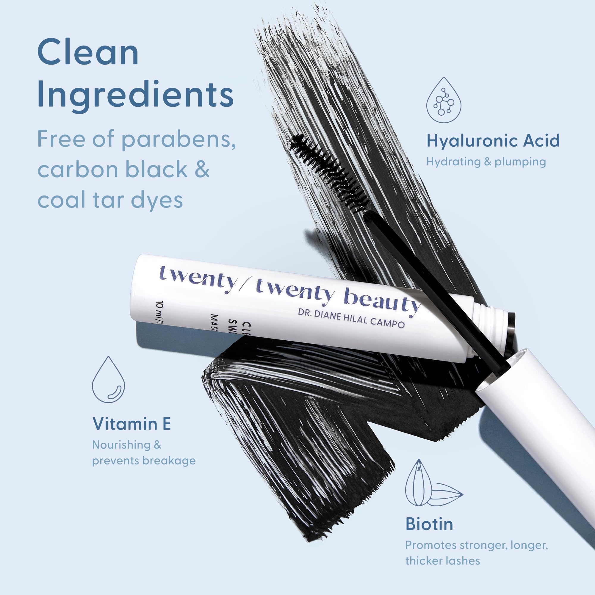 Applying Twenty Twenty Clean Sweep Mascara for defined, longer-looking lashes.