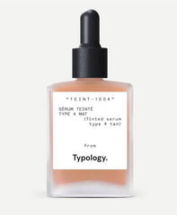 Typology tinted serum bottle for Type 4 tan skin delivering radiance with vitamin C.