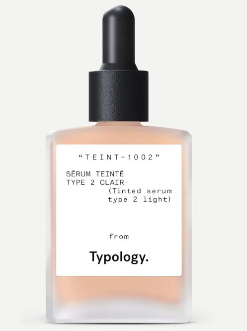 Typology tinted serum bottle dispensing for light, radiant coverage and hydration.