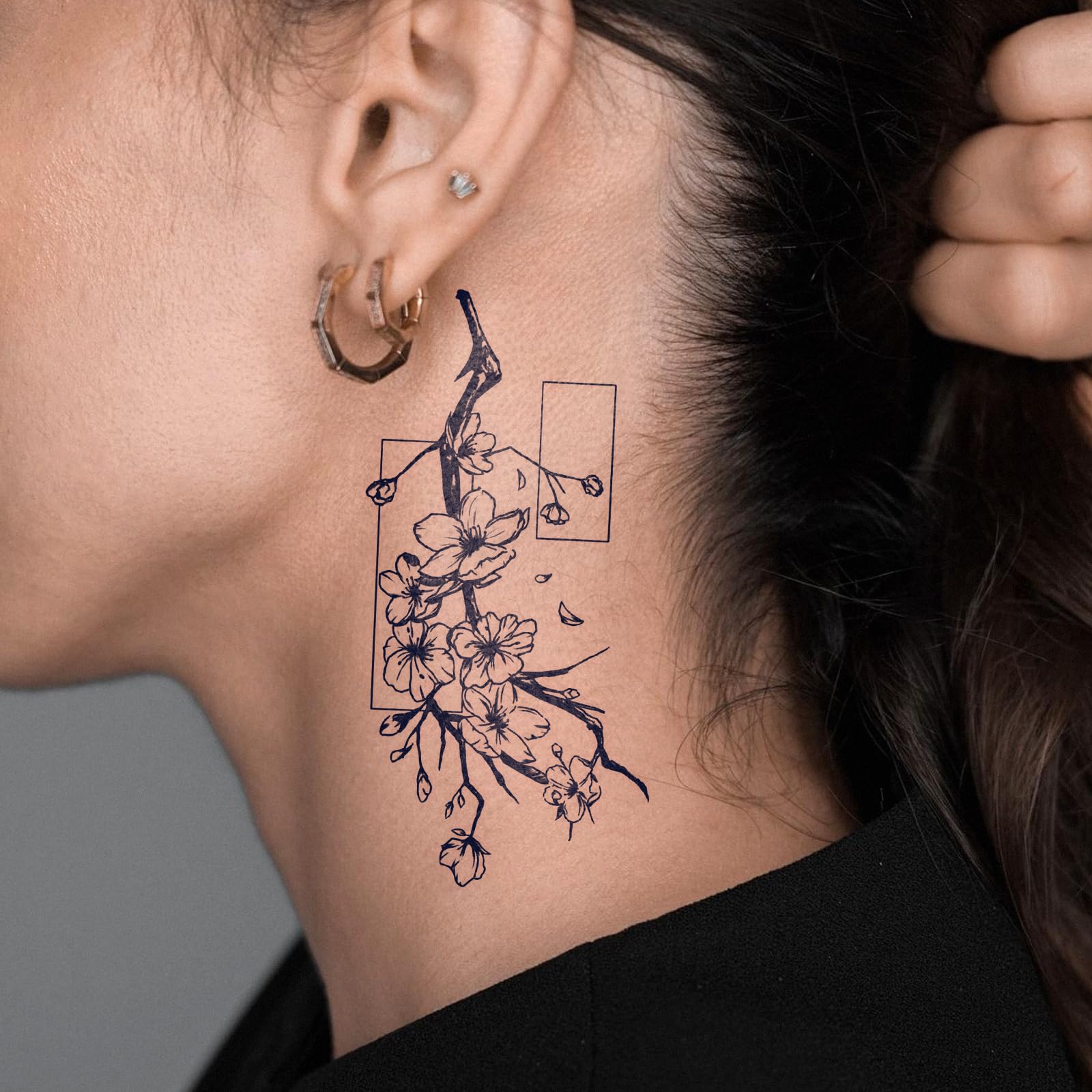UBICA cherry blossom tattoo motifs on skin for feminine style