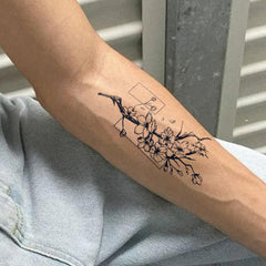 UBICA cherry blossom tattoo on arm ready for water-resistant wear
