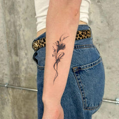 UBICA flower design tattoo on arm for natural elegance