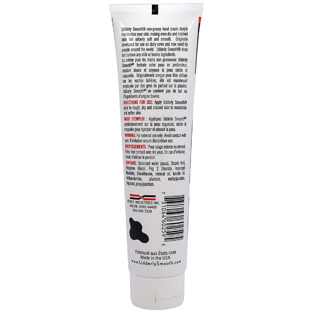 Udderly Smooth hand cream tube closeup showing label and texture benefits.