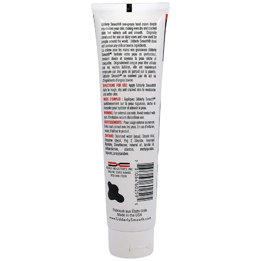 Udderly Smooth hand cream tube closeup showing label and texture benefits.