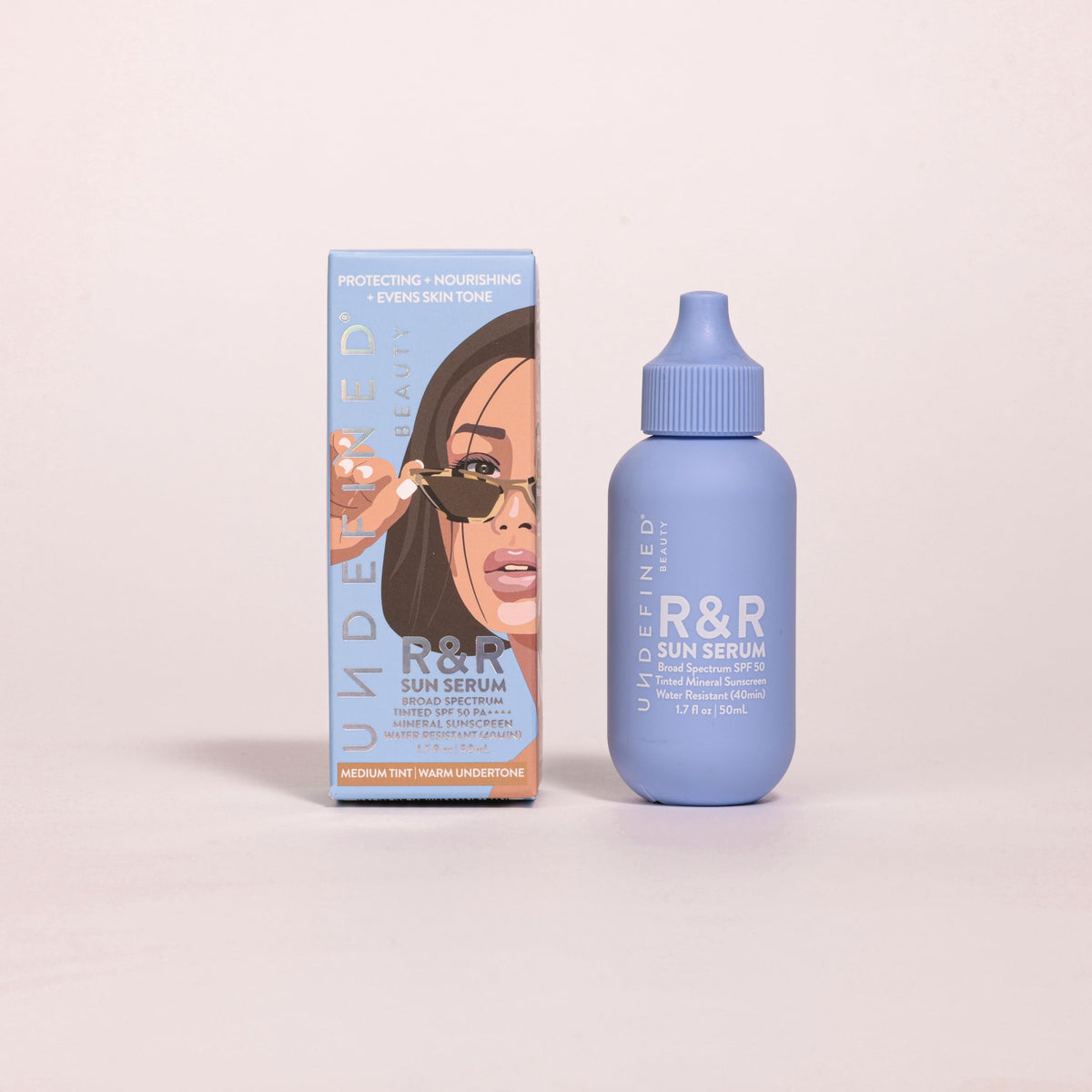 Undefined Beauty R&amp;R Sun Serum bottle with tinted mineral SPF 50 protection.