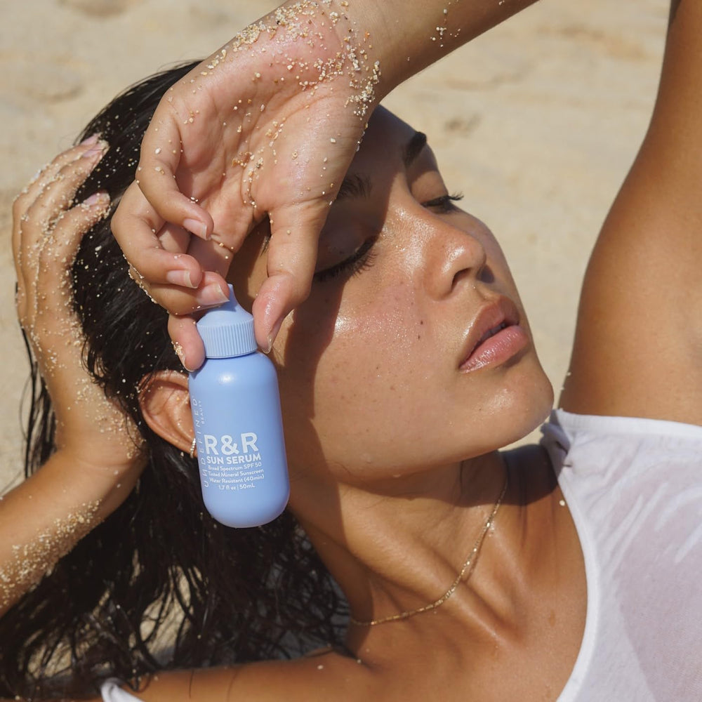 Undefined Beauty R&amp;R Sun Serum SPF 50 tint for radiant skin.
