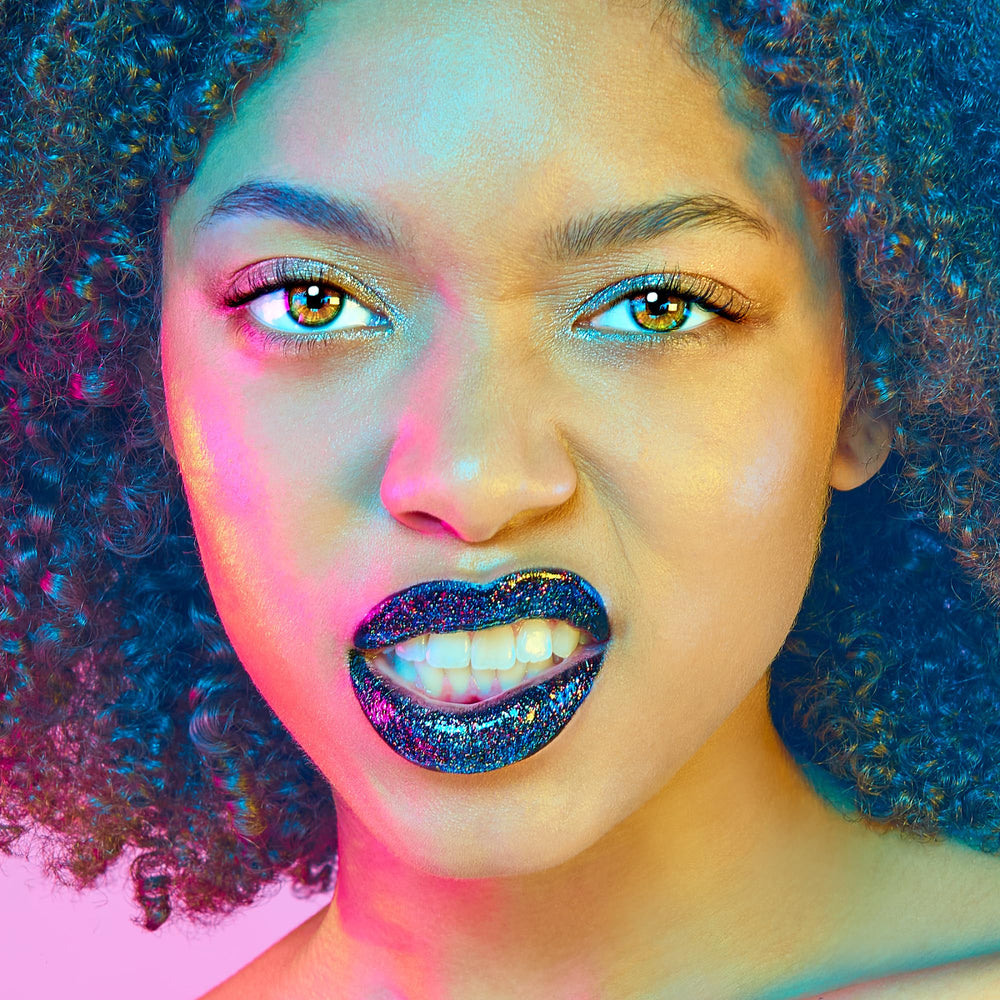UNICORN SNOT Quiet Riot Chasm black lipstick with multicolored glitter sparkle