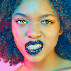 UNICORN SNOT Quiet Riot Chasm black lipstick with multicolored glitter sparkle