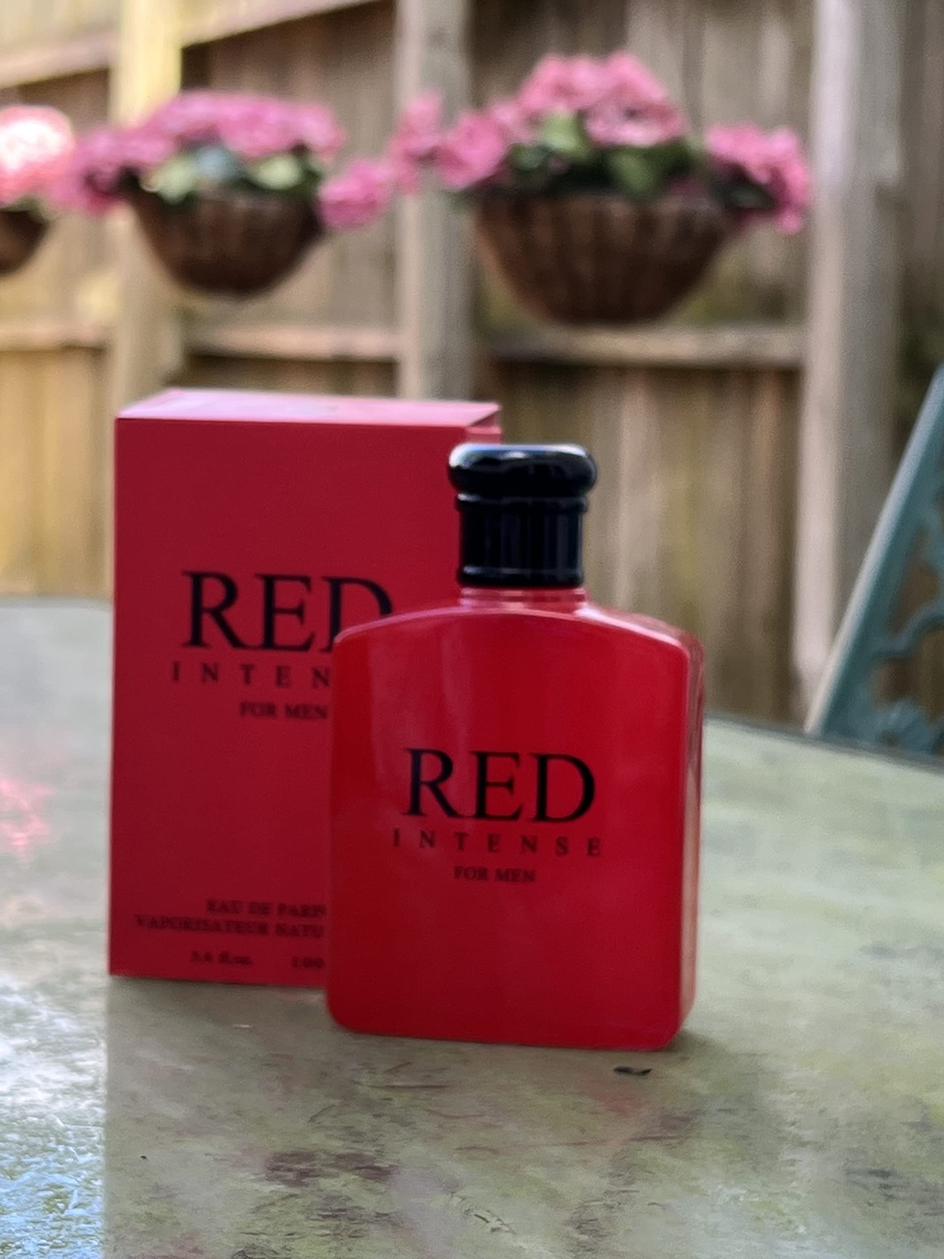 Spray action image showing easy application of United Scents Red Intense