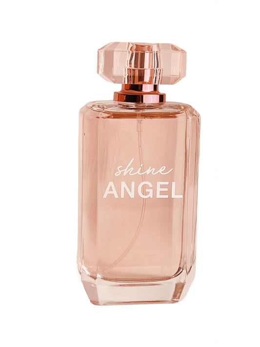 Close-up of Shine Angel glass ombre bottle highlighting refined texture and subtle glow.
