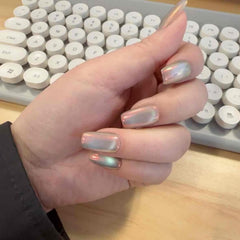 UNIYVOH cat eye nails with glitter shimmer on nail closeup