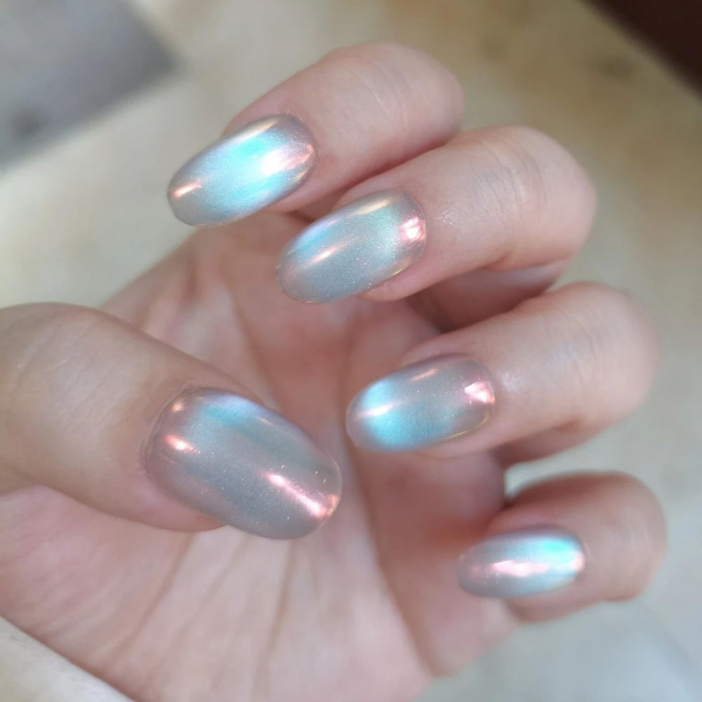 UNIYVOH French Tip nails offer a clean, modern manicure with shimmer.