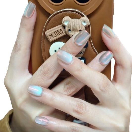 UNIYVOH cat eye nails hand closeup, elegant shimmer for daily wear.