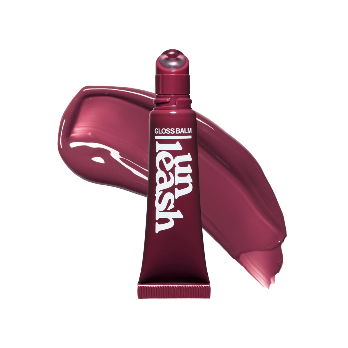 UNLEASHIA Sunset Dazzle Gloss Balm tube applicator delivers smooth, hydrating lip color.