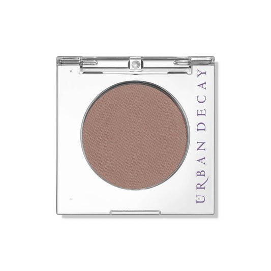 URBAN DECAY 24/7 Eyeshadow Tease compact open showing cool taupe matte shade for versatile looks