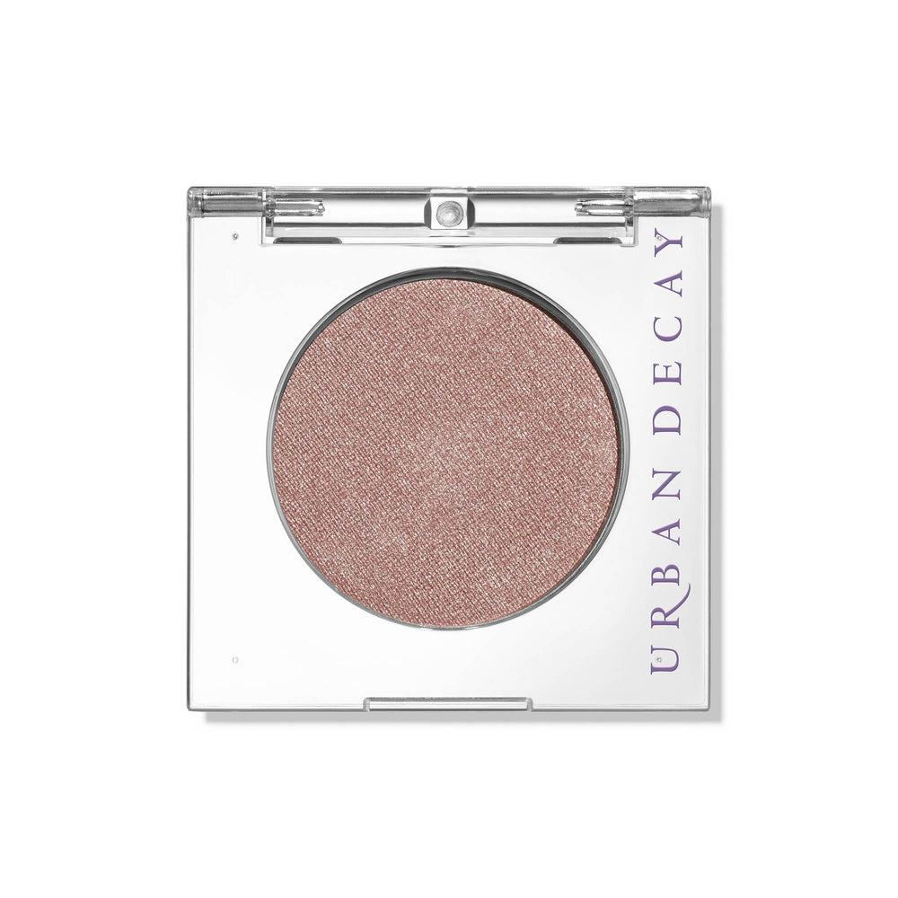 Urban Decay 24/7 Eyeshadow Single in Sin swatch showing champagne shimmer for a soft daytime glow