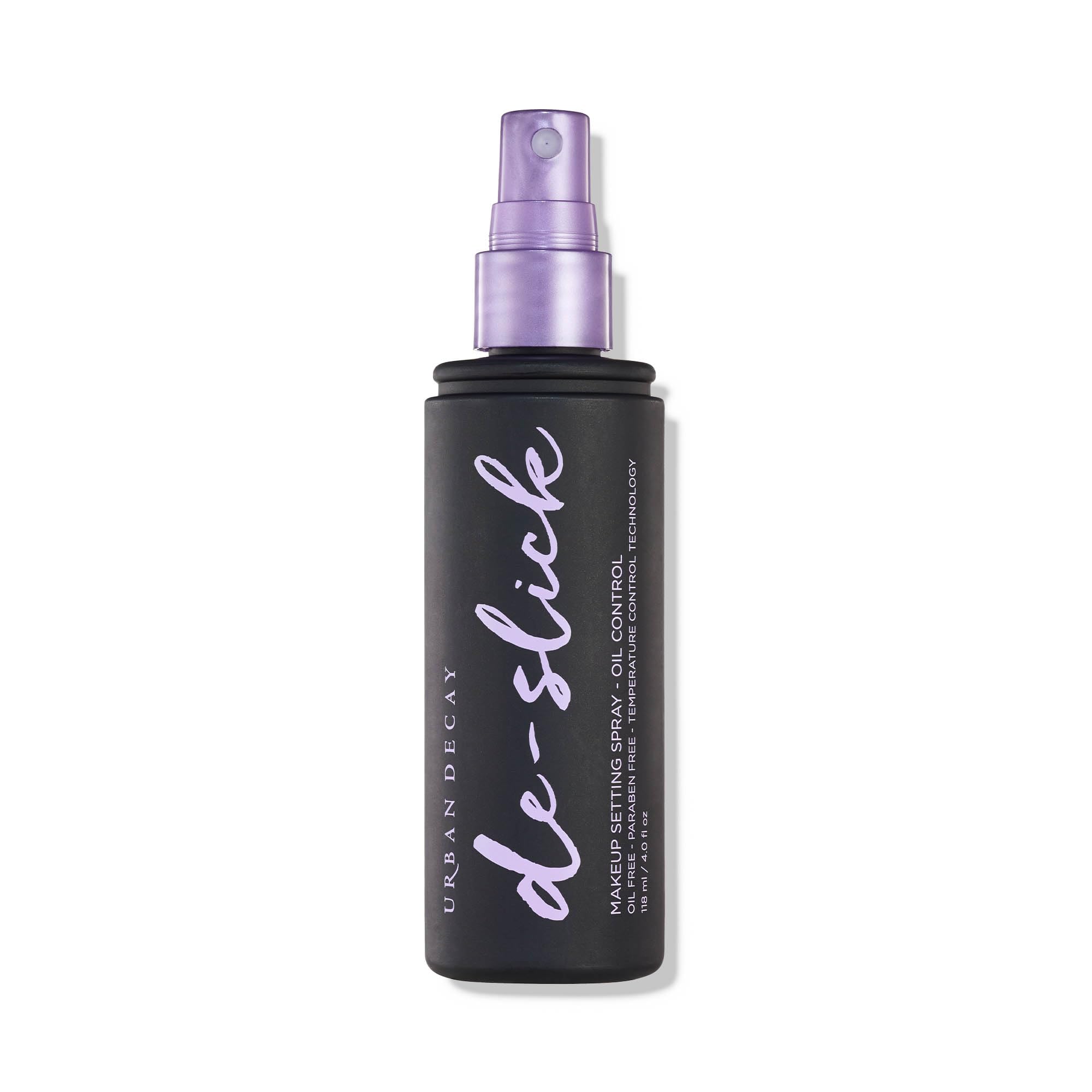 Urban Decay De-Slick bottle with matte spray for all-day oil control.