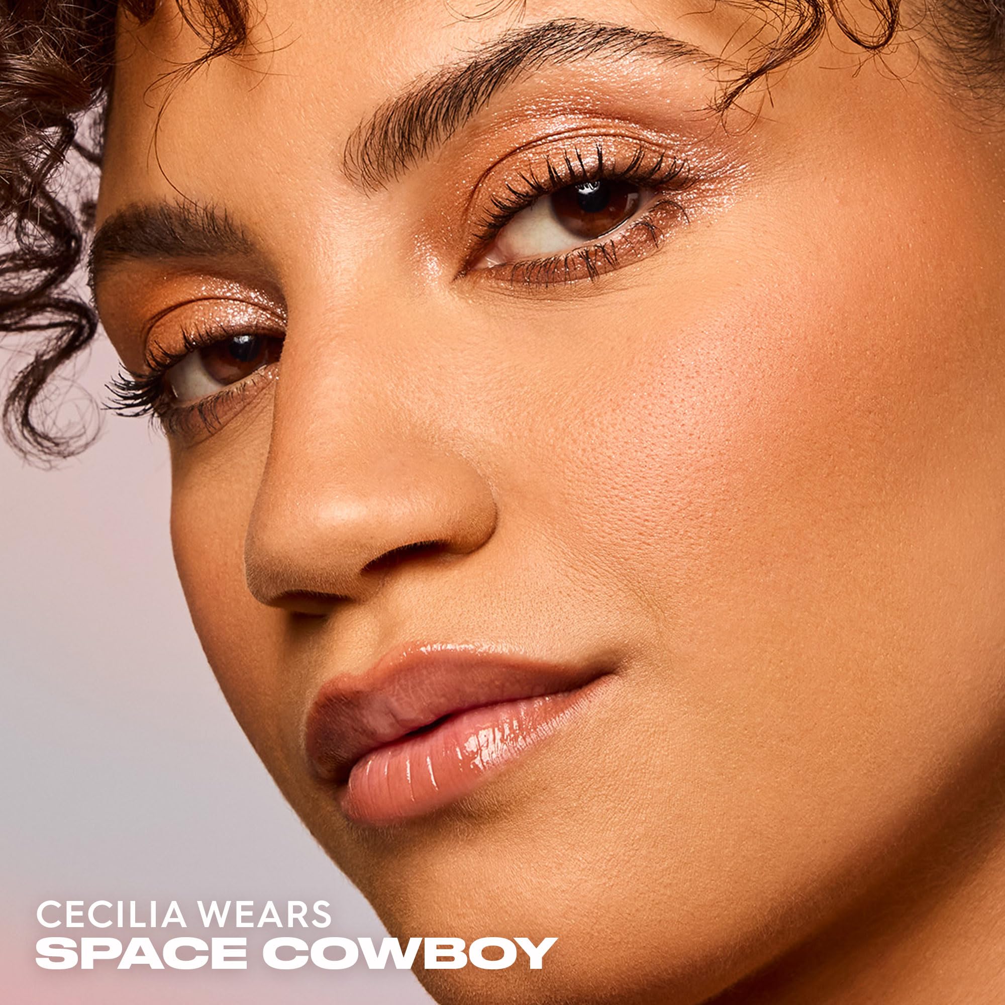 Urban Decay Moondust Space Cowboy bridal-glow look with luminous lid shine.