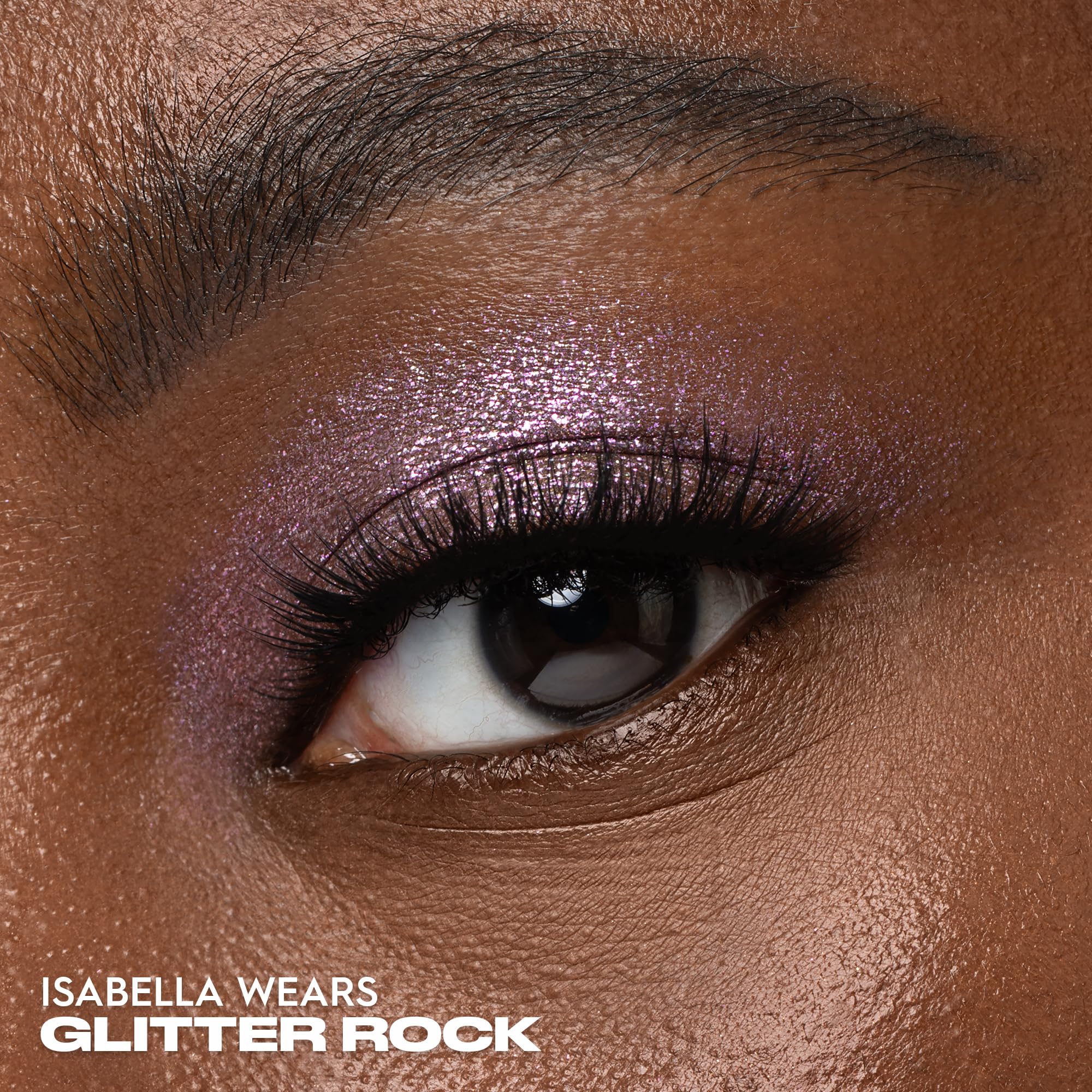 Urban Decay Moondust Space Cowboy sparkles with champagne gold and silver tones for dimension.