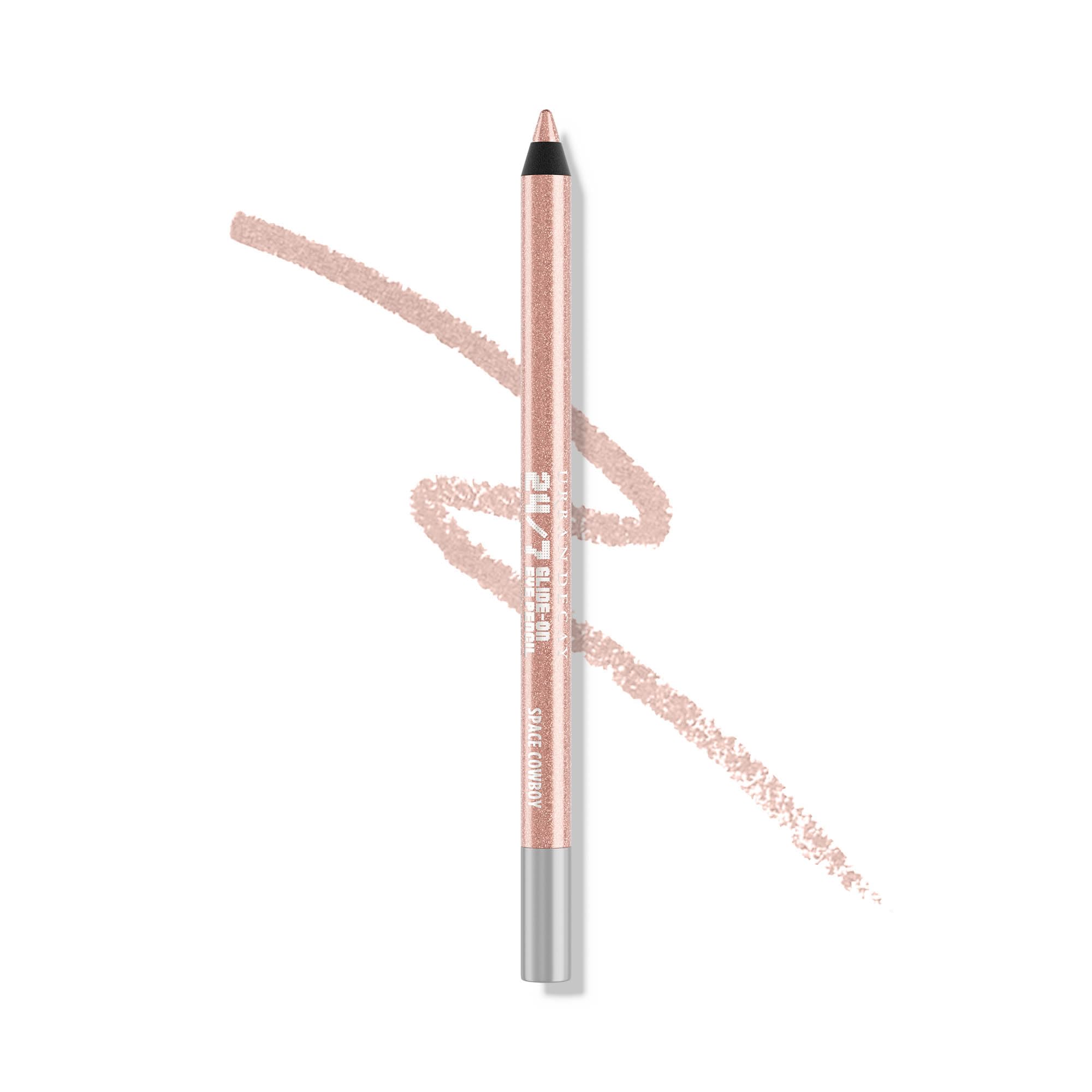 Urban Decay Space Cowboy swatches reveal peach shimmer and silver sparkle for versatile looks.