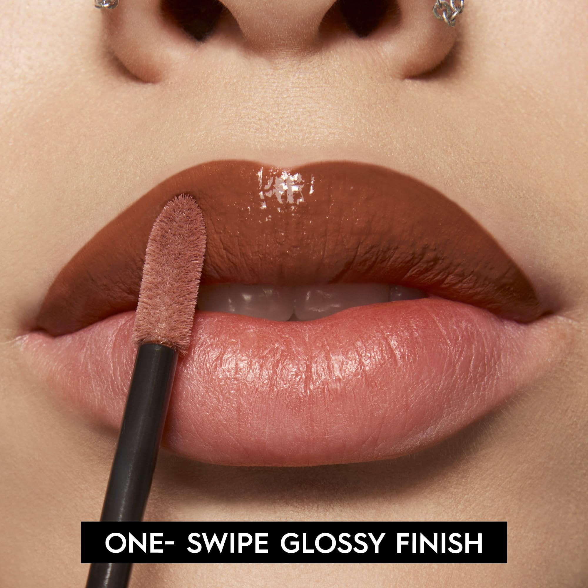 Urban Decay Vice Lip Bond No Restraints lip swatch with glossy shade and staying power.