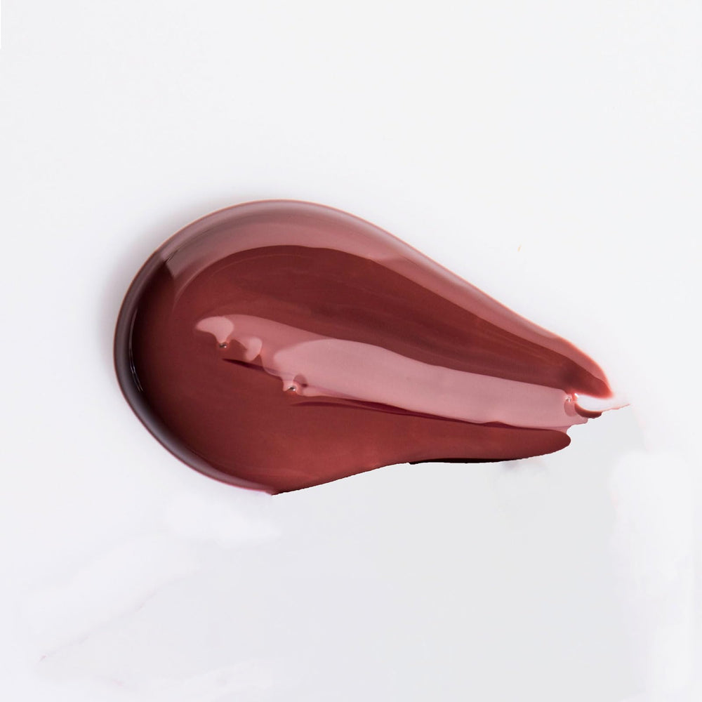 Applying Urban Skin Rx lip treatment for daily nourishment and protection