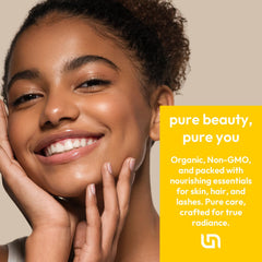 Close-up of Us Naturals label on organic jojoba oil highlighting purity