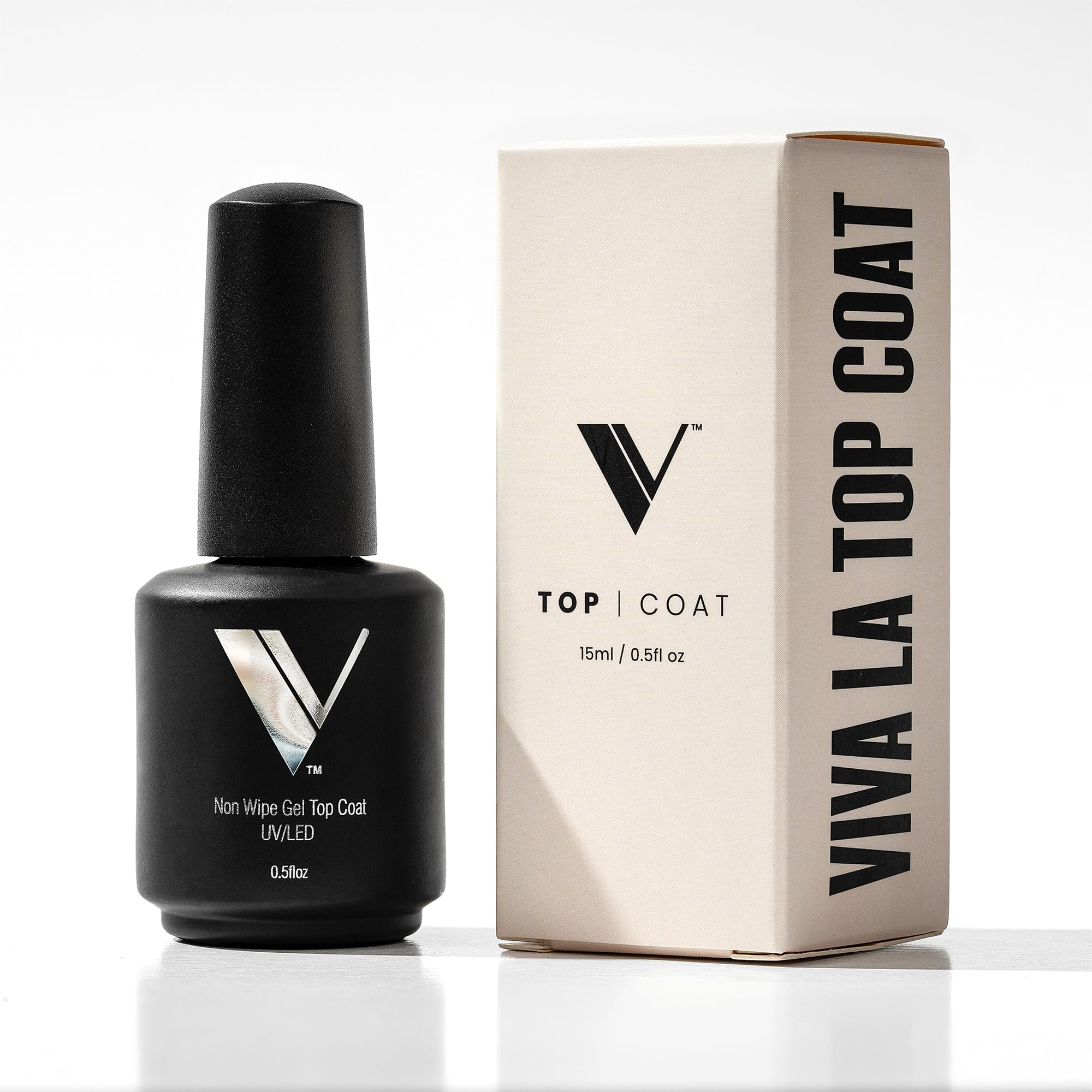 V Beauty Pure No Wipe Top Coat bottle close-up for a glossy, durable manicure.