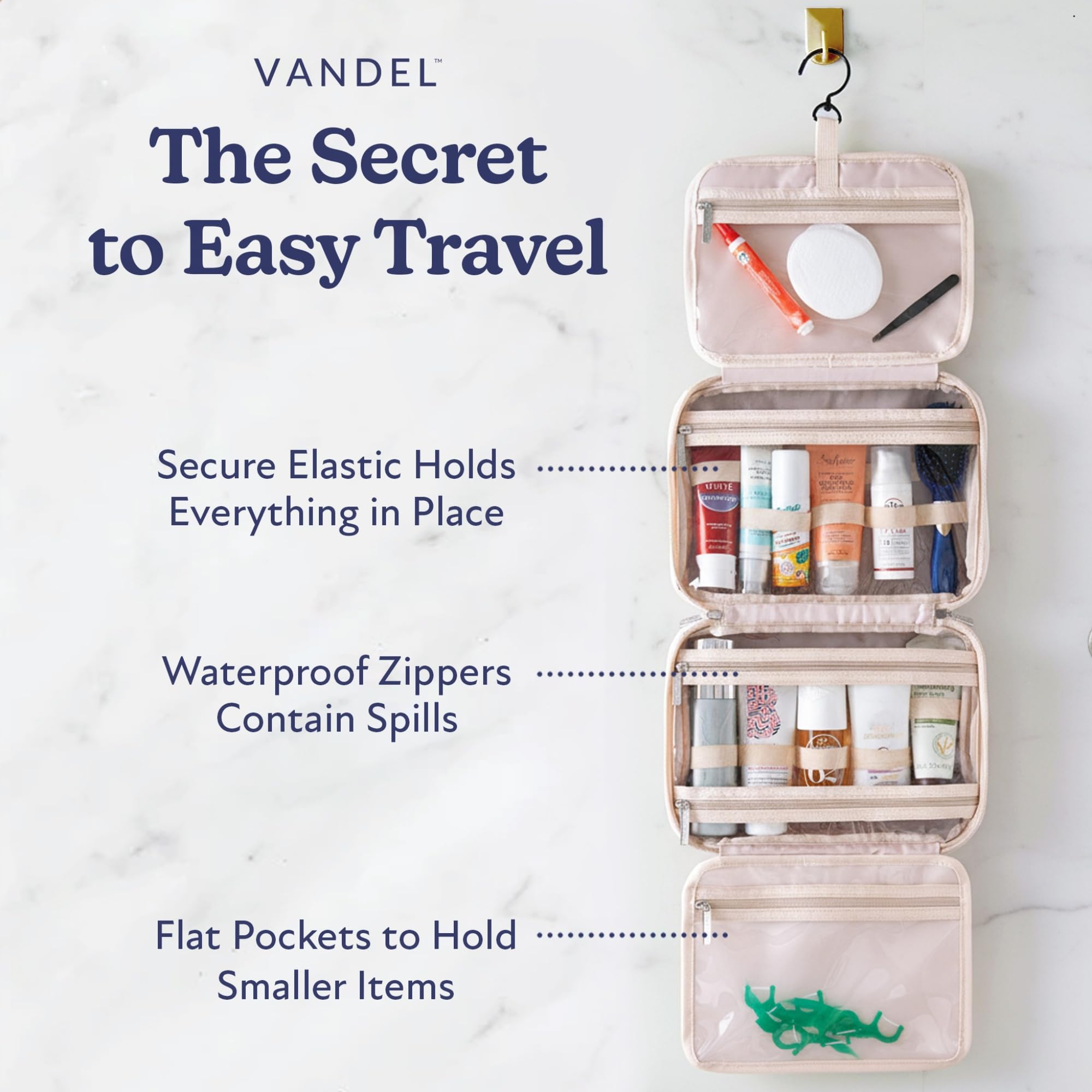 VANDEL four-compartment makeup bag for easy cosmetics access on trips.