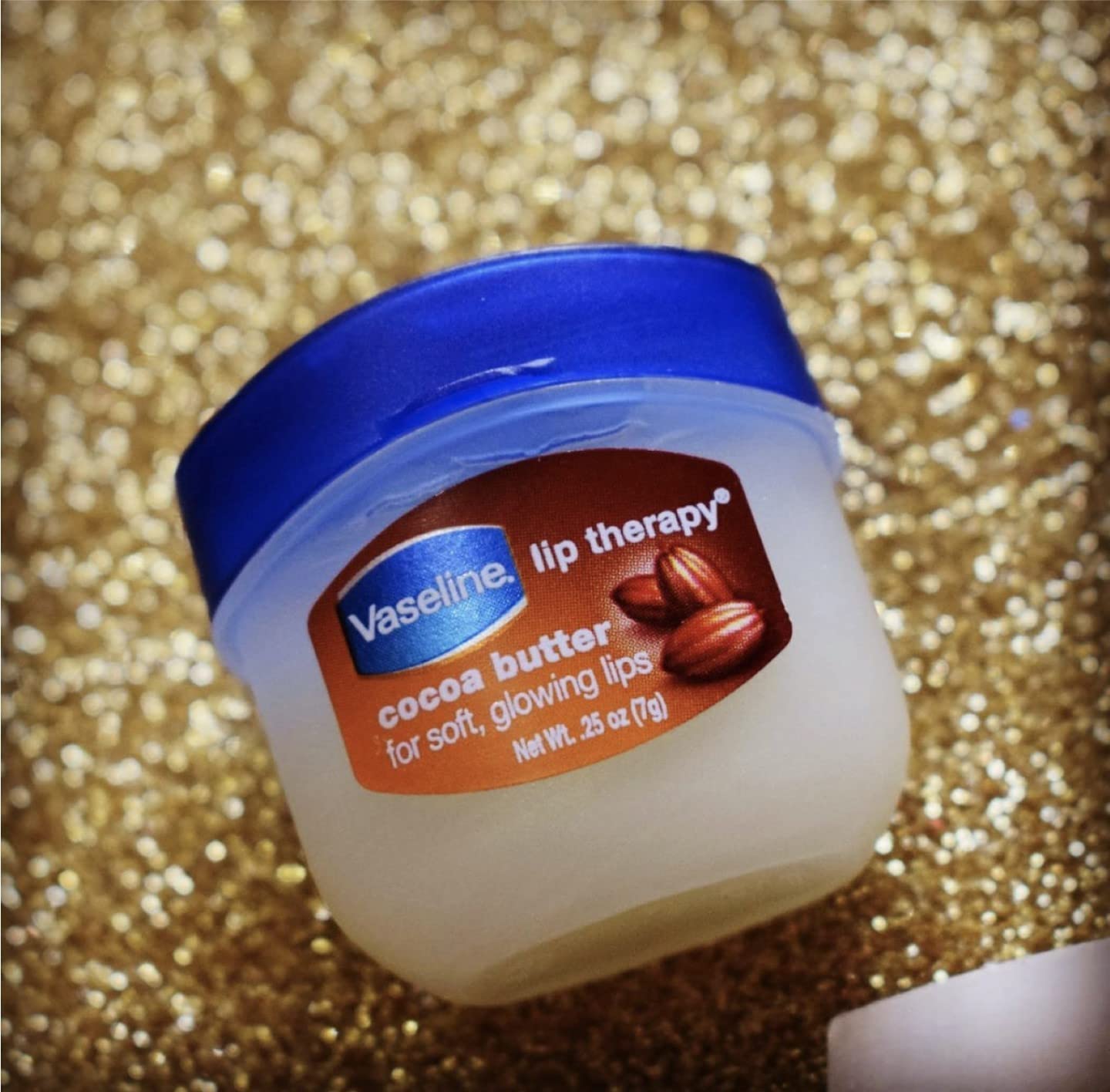 Close detail of Cocoa Butter label on Vaseline balm.