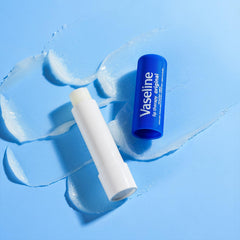 Vaseline Lip Therapy Original on lips being applied, easy daily lip care.