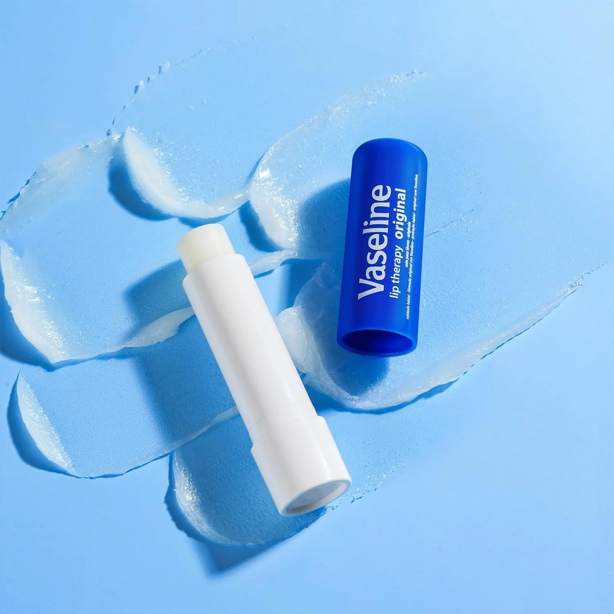 Lips receive hydration with Vaseline Lip Therapy Rosy Lips balm.