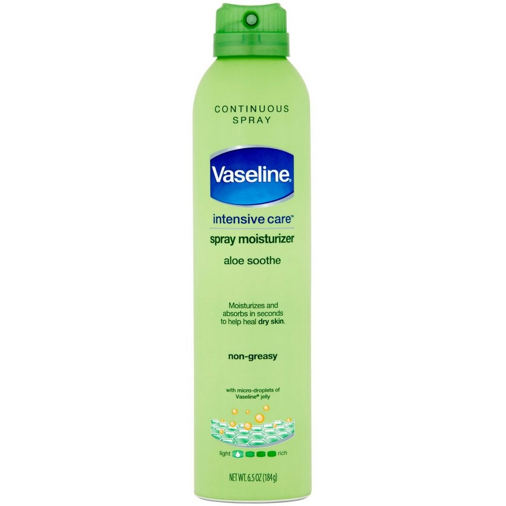 Vaseline Spray & Go Aloe Fresh bottle applying quick, non-greasy hydration for dry skin.