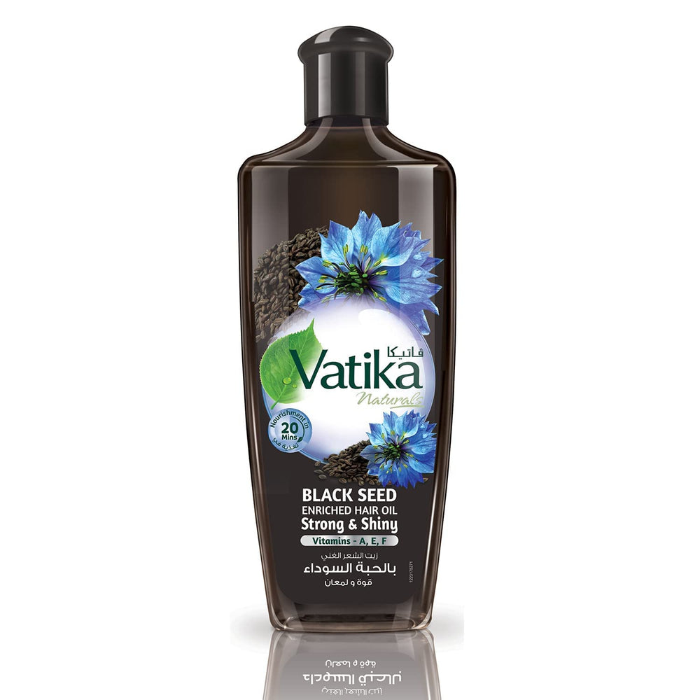 Vatika Naturals Dabur Enriched Black Seed Hair Oil bottle pouring to nourish scalp.