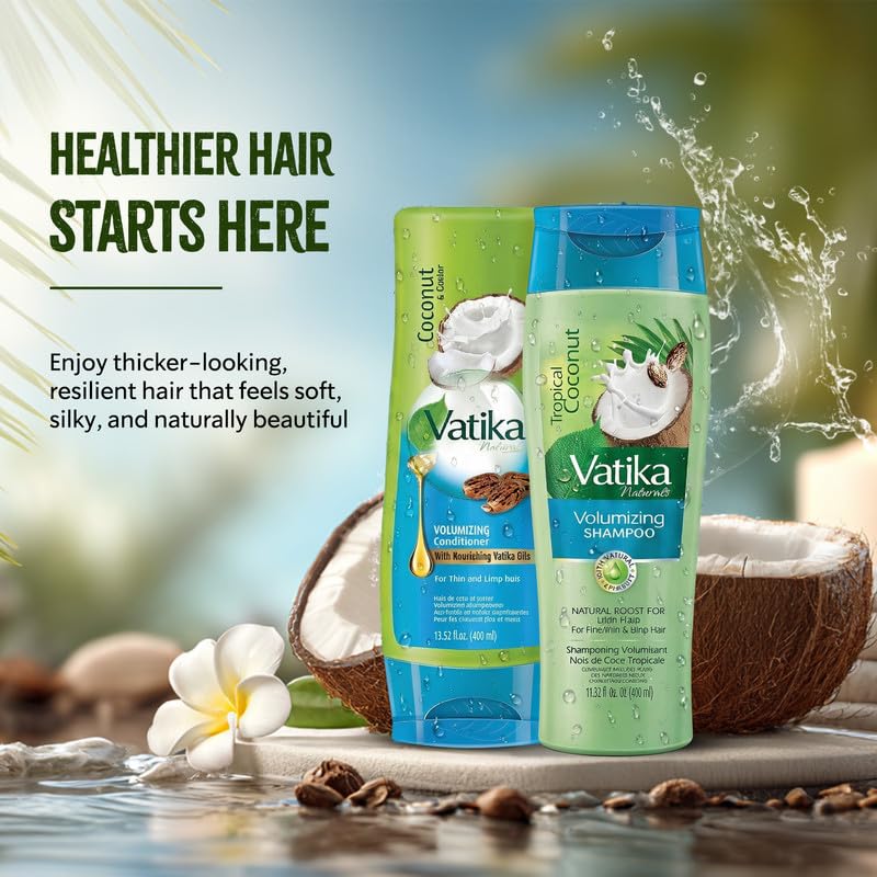 Vatika Naturals Coconut Conditioner bottle pouring, smooth detangling and frizz reduction.