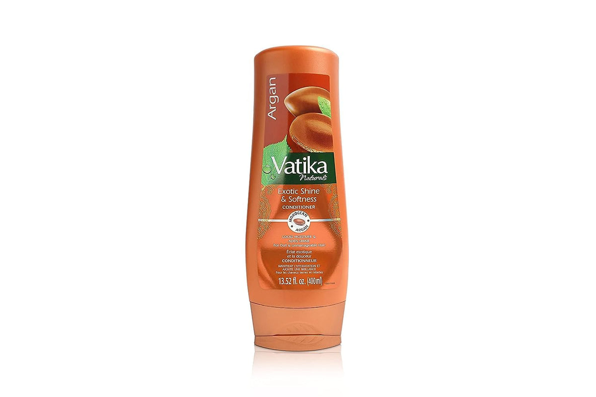 Vatika Naturals Moisturizing Conditioner bottle front shows hydrated, silky hair after use.