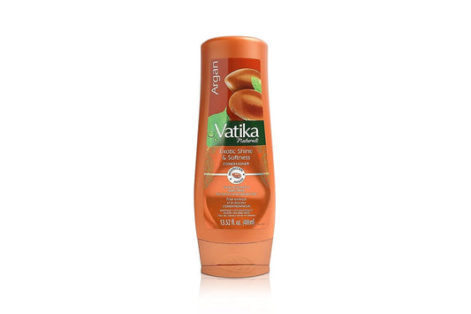 Vatika Naturals Moisturizing Conditioner bottle front shows hydrated, silky hair after use.