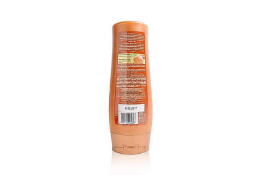 Vatika Naturals Moisturizing Conditioner label closeup highlights daily hydration with natural ingredients.