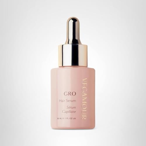 VEGAMOUR GRO Hair Serum pack beside mirror for everyday care.