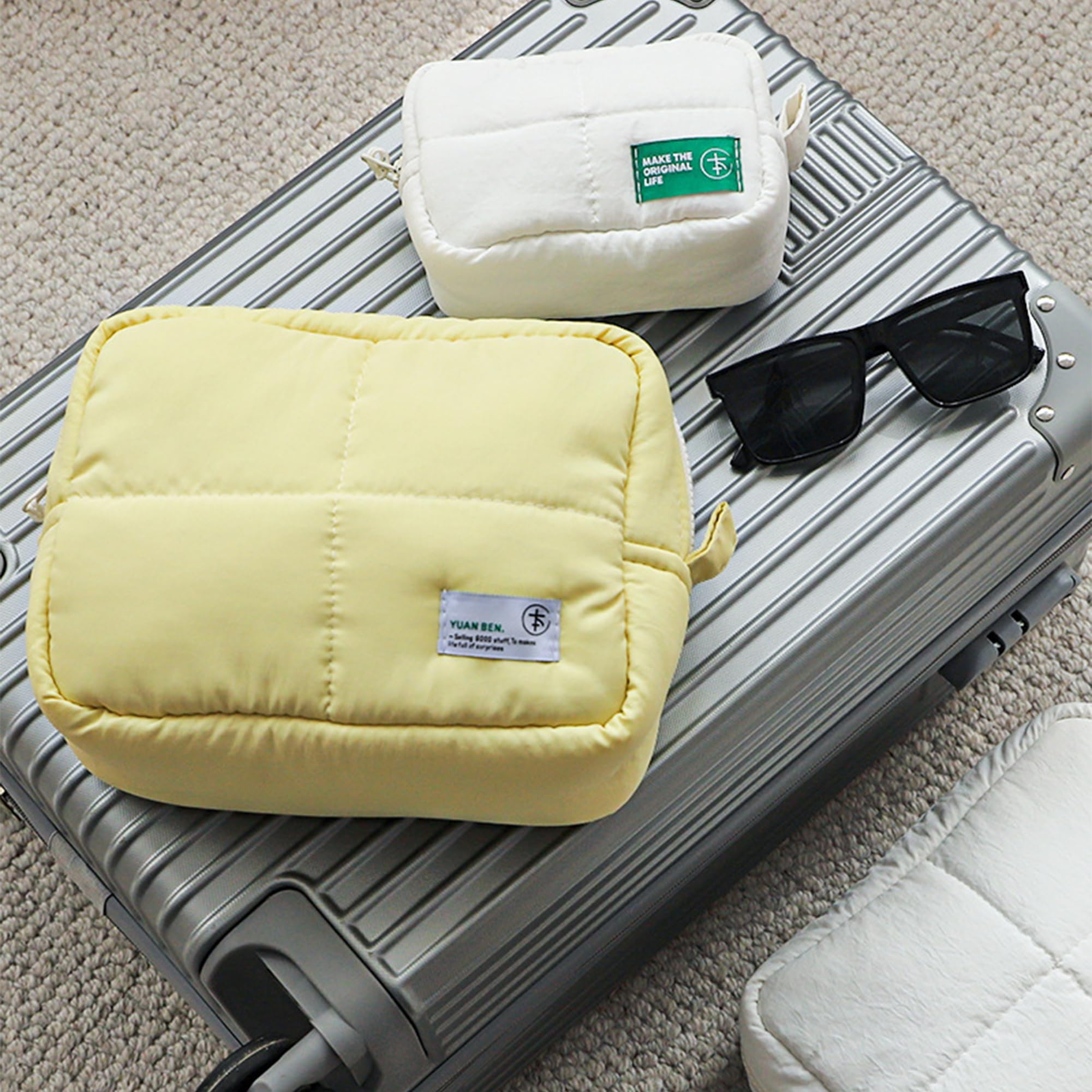 Veki Puffy small clutch-style bag fits cosmetics and essentials stylishly.
