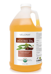 Velona Jojoba Oil 64oz bottle for skin and hair care benefits.