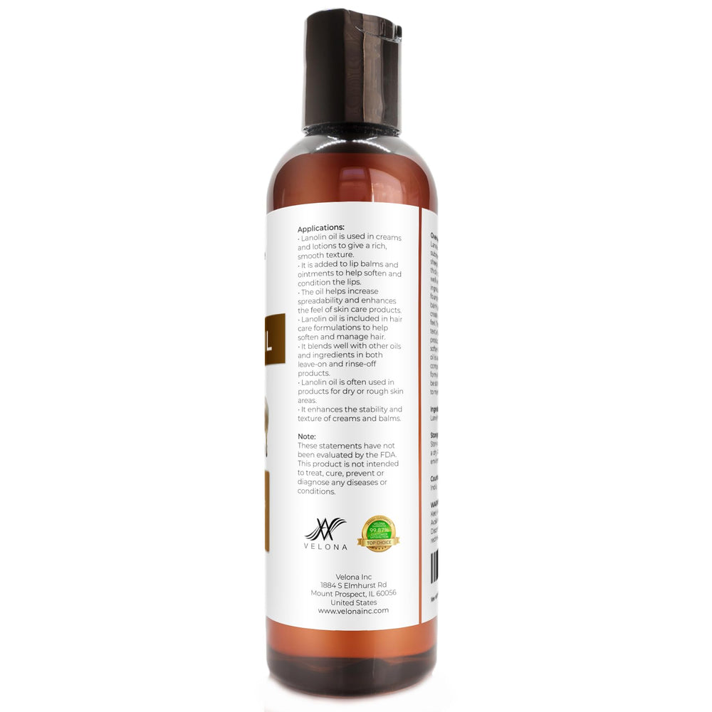 Velona Lanolin Oil applied to hair ends for smoothness.
