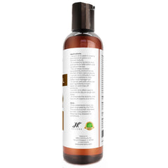 Velona Lanolin Oil applied to hair ends for smoothness.