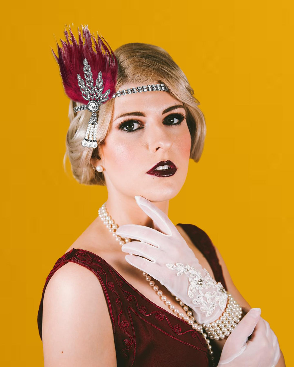Venofen black stretch headband with rhinestones ensures secure wear.