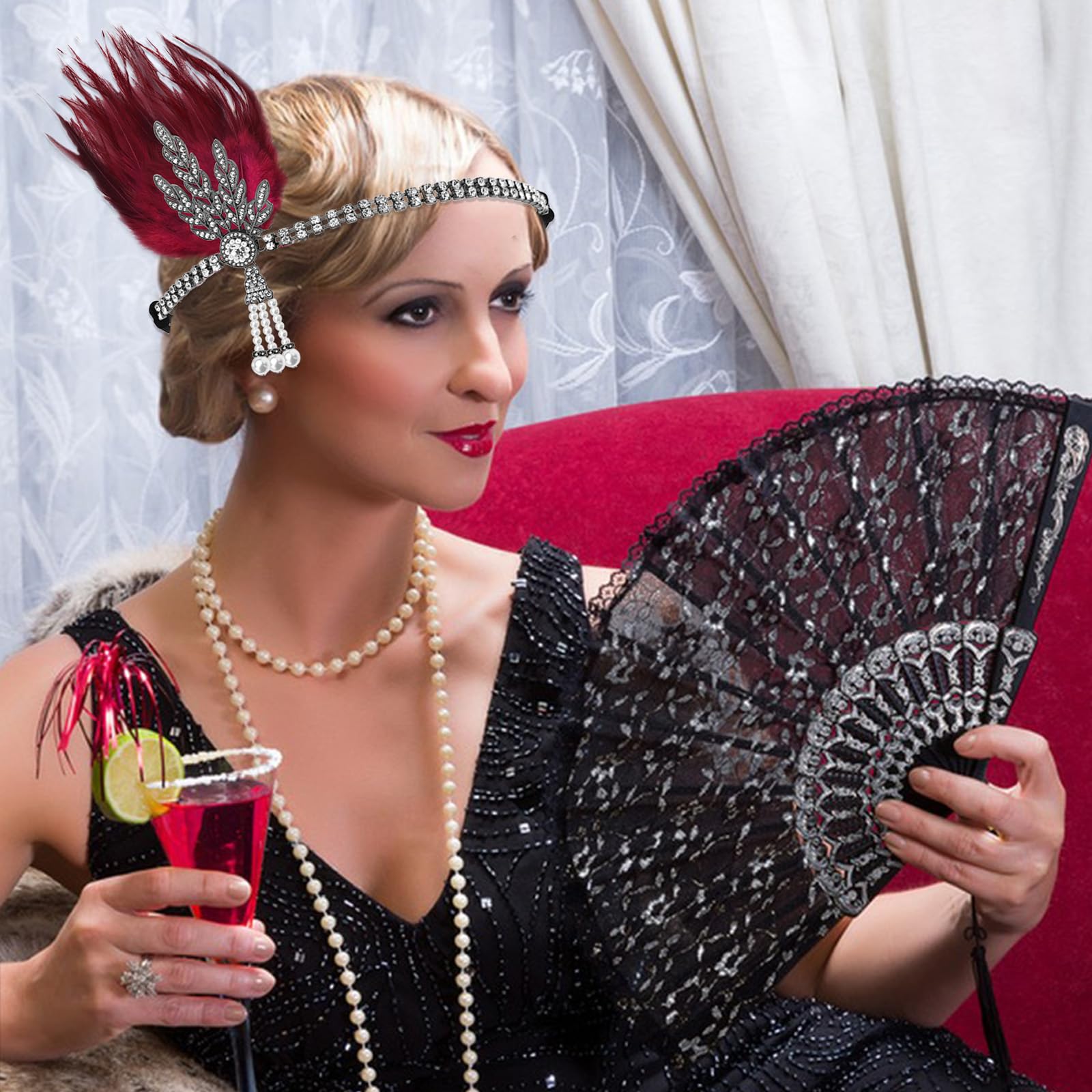 Venofen red feather headpiece worn for social events and photo shoots.