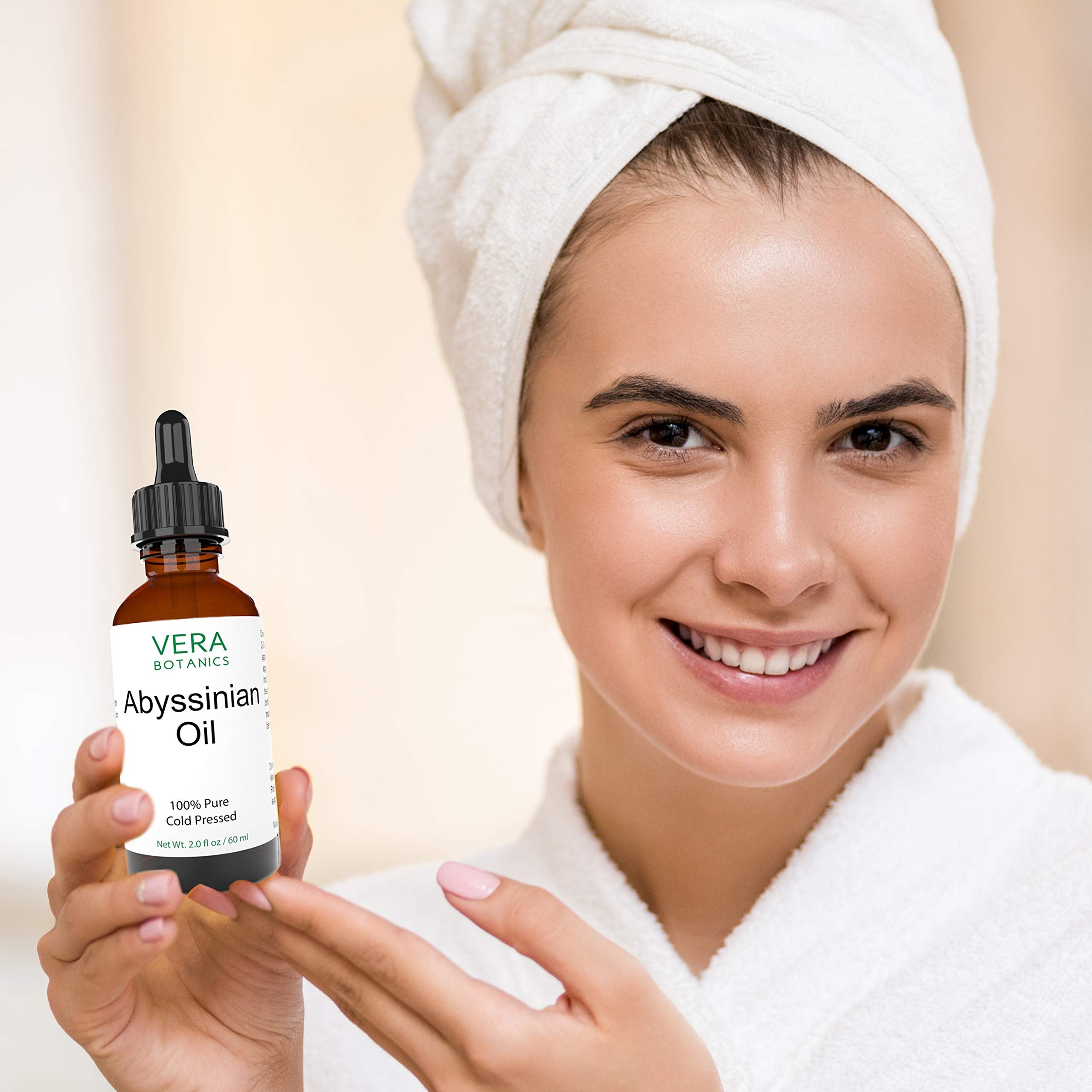 Vera Botanics Abyssinian oil on scalp and hair